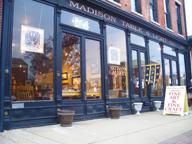 300 Block of East Main Street view Madison Indiana. Madison Table Works and Artisans Gallery, Free tour schedule, custome tables made in a former historic wagon factory, and local art for sale in gallery. Tour the art gallery.