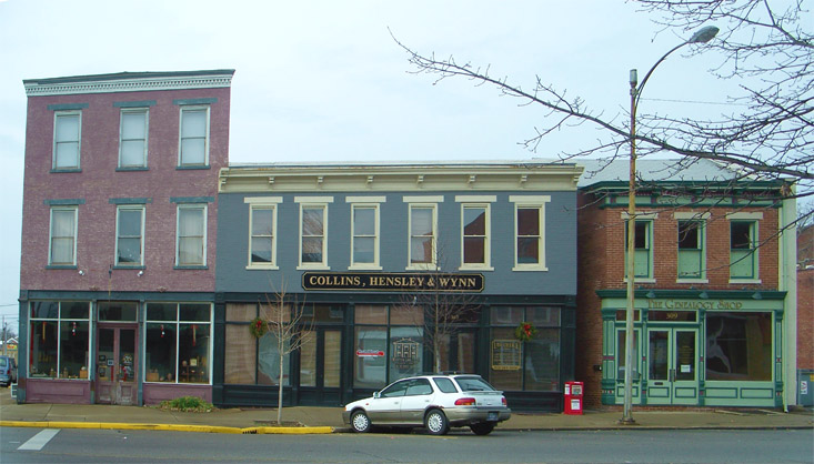 Picture of Jefferson Street Madison Indiana showing Carlson Studio's Fine Art Gallery, Collins Hensley & Wynn law firm, and The Genealogy Shop, located in Madison Historic District, Downtown Madison Indiana