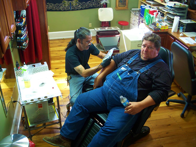 a closer look in the bull pin of tattoo artist Shane at Indiana Gun and Tatoo in Indiana’s Madison Historic District