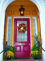 Picture of Azalea Manor’s front door with the fall wreath on the door. Click to Azalea Manor.